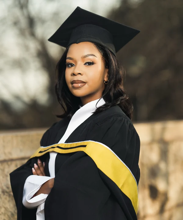 A Fine Shots graduation portrait, cap and gown