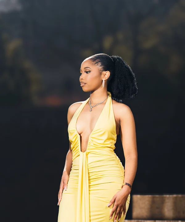 A Fine Shots golden-hour portrait in a yellow gown
