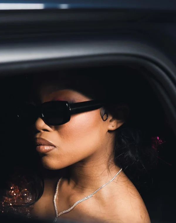 A Fine Shots matric dance portrait through a car window at night